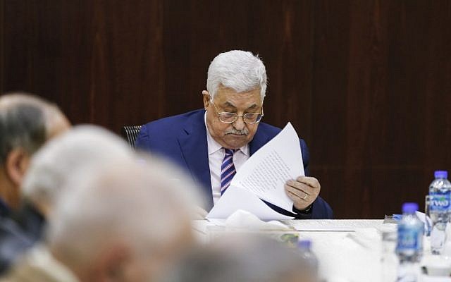 Palestinian president Mahmoud Abbas reads notes as he chairs a meeting of the Palestine Liberation Organization Executive Committee at the Palestinian Authority headquarters in the West Bank city of Ramallah on February 3, 2018. (AFP/ABBAS MOMANI) Palestinian president Mahmoud Abbas reads notes as he chairs a meeting of the Palestine Liberation Organization Executive Committee at the Palestinian Authority headquarters in the West Bank city of Ramallah on February 3, 2018. (AFP/ABBAS MOMANI)