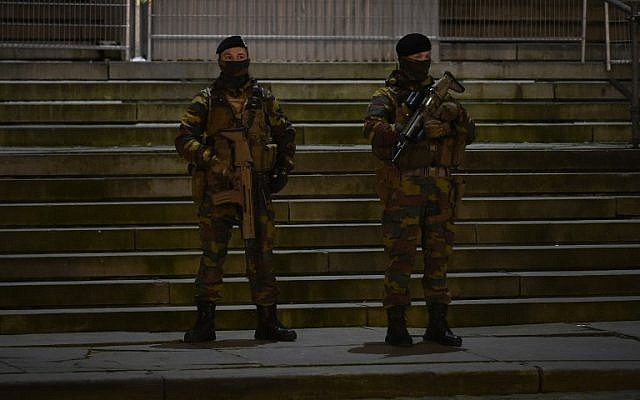 Belgian soldiers stand guard at the entrance of the Palais de Justice courthouse in Brussels on February 5, 2018. (AFP Photo/John Thys) Belgian soldiers stand guard at the entrance of the Palais de Justice courthouse in Brussels on February 5, 2018. (AFP Photo/John Thys)