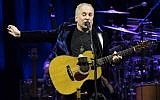 In this file photo taken on November 17, 2016 US singer Paul Simon performs on stage at the Bilbao Exhibition Center in the Spanish Basque city of Barakaldo on November 17, 2016. (AFP/Ander Gillenea)