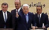 Palestinian Authority Mahmoud Abbas (C) attends the "Jerusalem Conference as the Capital of the Islamic Youth" in the West Bank city of Ramallah on February 6, 2018. (AFP PHOTO / ABBAS MOMANI)