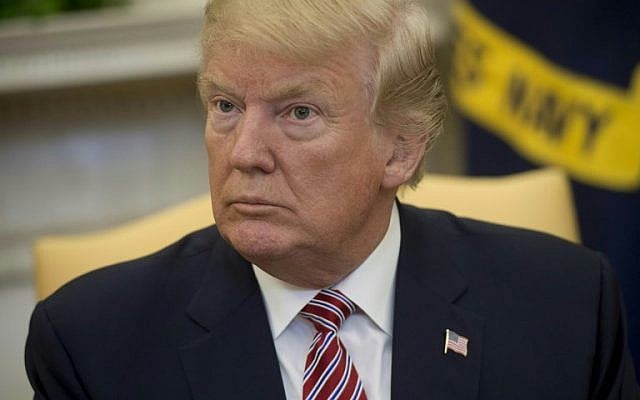 US President Donald Trump speaks to the press in the Oval Office of the White House in Washington, DC, February 9, 2018. (AFP/SAUL LOEB) US President Donald Trump speaks to the press in the Oval Office of the White House in Washington, DC, February 9, 2018. (AFP/SAUL LOEB)