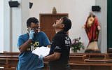 Indonesian police examine the scene after a knife attack at a church during a Sunday mass in Sleman, Yogyakarta province on February 11, 2018. (AFP PHOTO / HENRYANTO)