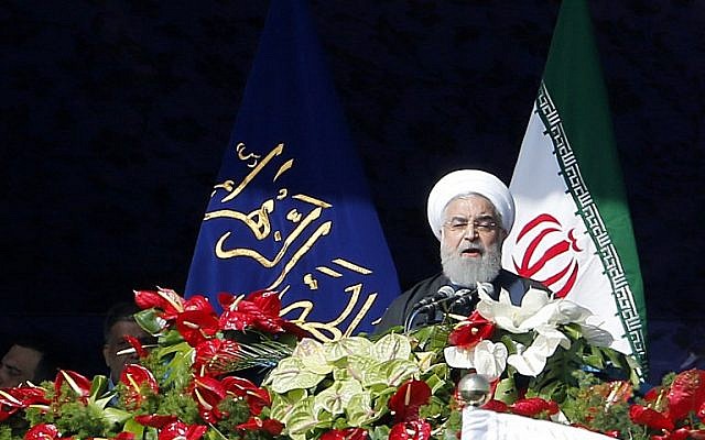 Iranian President Hassan Rouhani delivers a speech at the Azadi Square in the capital Tehran during a ceremony to mark the 39th anniversary of the Islamic revolution, on February 11, 2018. (AFP PHOTO / ATTA KENARE) Iranian President Hassan Rouhani delivers a speech at the Azadi Square in the capital Tehran during a ceremony to mark the 39th anniversary of the Islamic revolution, on February 11, 2018. (AFP PHOTO / ATTA KENARE)