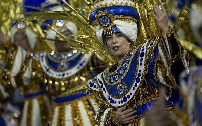 A reveler of the Portela samba school performs during the second night of Rio's Carnival at the Sambadrome in Rio de Janeiro, Brazil, on February 12, 2018. (AFP/Mauro PIMENTEL)
