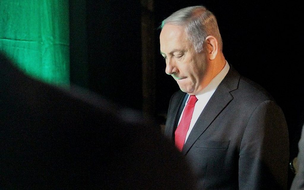 Prime Minister Benjamin Netanyahu leaves the Muni World conference in Tel Aviv on February 14, 2018. (AFP Photo/Jack Guez) Prime Minister Benjamin Netanyahu leaves the Muni World conference in Tel Aviv on February 14, 2018. (AFP Photo/Jack Guez)
