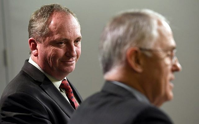 This file photo taken on July 5, 2016 shows Australia's Deputy Prime Minister Barnaby Joyce (L) looking at Prime Minister Malcolm Turnbull (R) during a press conference in Sydney. (AFP PHOTO / William WEST) This file photo taken on July 5, 2016 shows Australia's Deputy Prime Minister Barnaby Joyce (L) looking at Prime Minister Malcolm Turnbull (R) during a press conference in Sydney. (AFP PHOTO / William WEST)