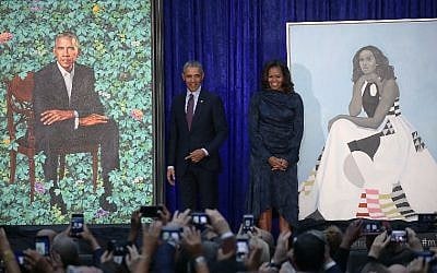 Former US president Barack Obama and former first lady Michelle Obama stand next to their newly unveiled portraits during a ceremony at the Smithsonian's National Portrait Gallery, on February 12, 2018 in Washington, DC. (Mark Wilson/Getty Images/AFP) Former US president Barack Obama and former first lady Michelle Obama stand next to their newly unveiled portraits during a ceremony at the Smithsonian's National Portrait Gallery, on February 12, 2018 in Washington, DC. (Mark Wilson/Getty Images/AFP)