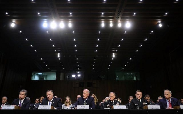 Left to right: Federal Bureau of Investigation Director Christopher Wray, Central Intelligence Agency Director Mike Pompeo, Director of National Intelligence Dan Coats, Defense Intelligence Agency Director Lt. Gen. Robert Ashley, National Security Agency Director Admiral Michael Rogers and National Geospatial Intelligence Agency Director Robert Cardillo testify before the Senate Intelligence Committee in the Hart Senate Office Building on Capitol Hill in Washington, DC, February 13, 2018. (Chip Somodevilla/Getty Images/AFP) Left to right: Federal Bureau of Investigation Director Christopher Wray, Central Intelligence Agency Director Mike Pompeo, Director of National Intelligence Dan Coats, Defense Intelligence Agency Director Lt. Gen. Robert Ashley, National Security Agency Director Admiral Michael Rogers and National Geospatial Intelligence Agency Director Robert Cardillo testify before the Senate Intelligence Committee in the Hart Senate Office Building on Capitol Hill in Washington, DC, February 13, 2018. (Chip Somodevilla/Getty Images/AFP)