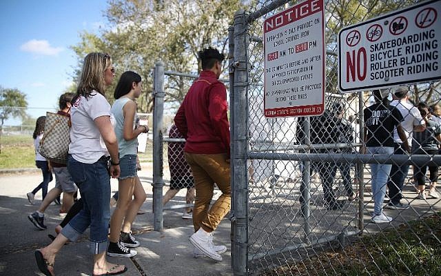 People visit Marjory Stoneman Douglas High School on February 25, 2018 in Parkland, Florida. (Joe Raedle/Getty Images/AFP) People visit Marjory Stoneman Douglas High School on February 25, 2018 in Parkland, Florida. (Joe Raedle/Getty Images/AFP)