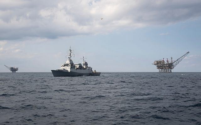 An Israeli Navy Sa'ar 5 corvette defends two natural gas extraction platforms off Israel's coast, in an undated photograph. (Israel Defense Forces)