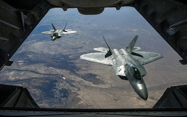 Illustrative: Two US Air Force F-22 Raptors fly over Syria, February 2, 2018. (Air National Guard/ Staff Sgt. Colton Elliott via Department of Defense) Illustrative: Two US Air Force F-22 Raptors fly over Syria, February 2, 2018. (Air National Guard/ Staff Sgt. Colton Elliott via Department of Defense)