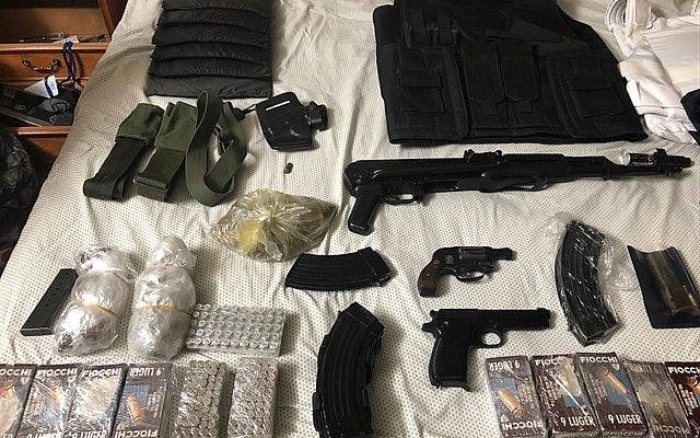 A collection of guns and military gear seized in an IDF operation in Hebron on February 27, 2018. (Israel Defense Forces) A collection of guns and military gear seized in an IDF operation in Hebron on February 27, 2018. (Israel Defense Forces)