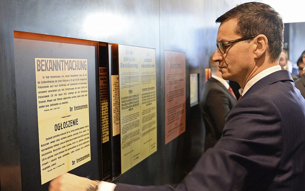 Polish Prime Minister Mateusz Morawiecki visits the Ulma Family Museum of Poles Who Saved Jews during WWII, in Markowa, Poland, on Februay 2, 2018. (AP Photo/Alik Keplicz)