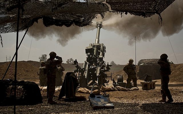 US soldiers from the 82nd Airborne Division fire artillery in support of Iraqi forces fighting Islamic State militants from their base east of Mosul on April 17, 2017. (AP Photo/Maya Alleruzzo, File) US soldiers from the 82nd Airborne Division fire artillery in support of Iraqi forces fighting Islamic State militants from their base east of Mosul on April 17, 2017. (AP Photo/Maya Alleruzzo, File)