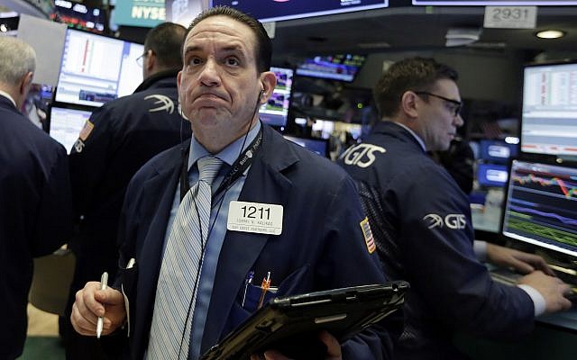 Trader Tommy Kalikas works on the floor of the New York Stock Exchange, Monday, February 5, 2018. (AP Photo/Richard Drew) Trader Tommy Kalikas works on the floor of the New York Stock Exchange, Monday, February 5, 2018. (AP Photo/Richard Drew)