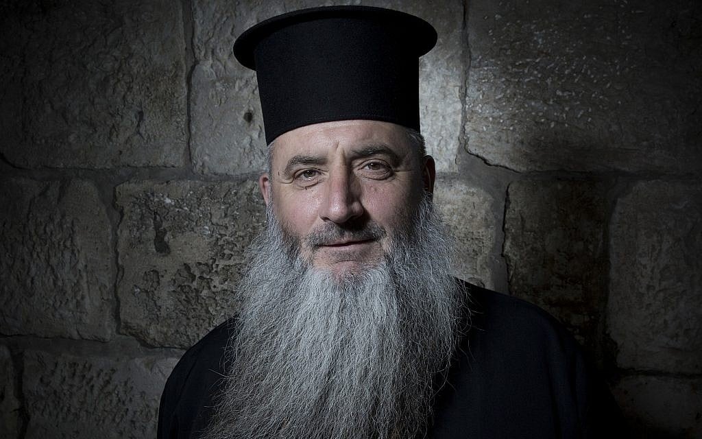 Father Boris Manov poses for a portrait in Jerusalem's Old City, February 11, 2018. (AP Photo/Oded Balilty)
