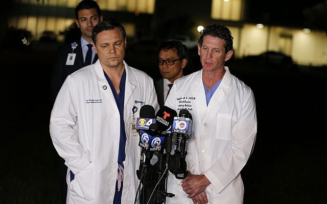 Dr. Igor Nichiporenko, Medical Director Trauma, left, and Dr. Evan Boyer, Medical Director, Emergency Services, speak about treating victims and the suspect at a press conference outside Broward Health North hospital, February 14, 2018, in Deerfield Beach, Fla. (AP Photo/Joe Skipper) Dr. Igor Nichiporenko, Medical Director Trauma, left, and Dr. Evan Boyer, Medical Director, Emergency Services, speak about treating victims and the suspect at a press conference outside Broward Health North hospital, February 14, 2018, in Deerfield Beach, Fla. (AP Photo/Joe Skipper)