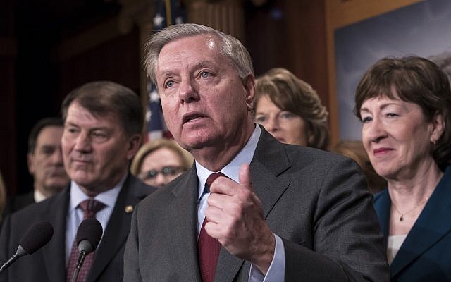 Sen. Lindsey Graham, R-S.C., flanked by, Sen. Mike Rounds, R-S.D., left, and Sen. Susan Collins, R-Maine, discuss the bipartisan immigration deal they reached during a news conference at the Capitol in Washington, Thursday, February 15, 2018. (AP Photo/J. Scott Applewhite) Sen. Lindsey Graham, R-S.C., flanked by, Sen. Mike Rounds, R-S.D., left, and Sen. Susan Collins, R-Maine, discuss the bipartisan immigration deal they reached during a news conference at the Capitol in Washington, Thursday, February 15, 2018. (AP Photo/J. Scott Applewhite)