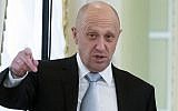 Russian businessman Yevgeny Prigozhin gestures at the Konstantin palace outside St. Petersburg, Russia, on August 9, 2016. (AP Photo/Alexander Zemlianichenko)