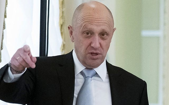 Russian businessman Yevgeny Prigozhin gestures at the Konstantin palace outside St. Petersburg, Russia, on August 9, 2016. (AP Photo/Alexander Zemlianichenko) Russian businessman Yevgeny Prigozhin gestures at the Konstantin palace outside St. Petersburg, Russia, on August 9, 2016. (AP Photo/Alexander Zemlianichenko)
