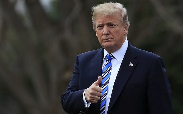 US President Donald Trump gestures as he walks as he leaves the White House, February 16, 2018, in Washington, for a trip to his private Mar-a-Lago resort in Florida. (AP Photo/Manuel Balce Ceneta) US President Donald Trump gestures as he walks as he leaves the White House, February 16, 2018, in Washington, for a trip to his private Mar-a-Lago resort in Florida. (AP Photo/Manuel Balce Ceneta)