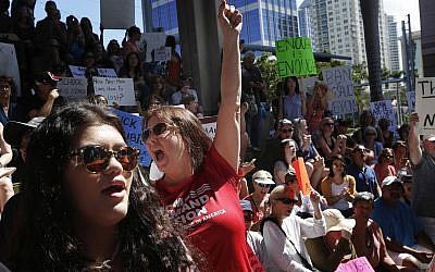 Demonstrators at protest against guns on the steps of the Broward County Federal courthouse in Fort Lauderdale, Florida, on Saturday, February 17, 2018. (AP Photo/Brynn Anderson)