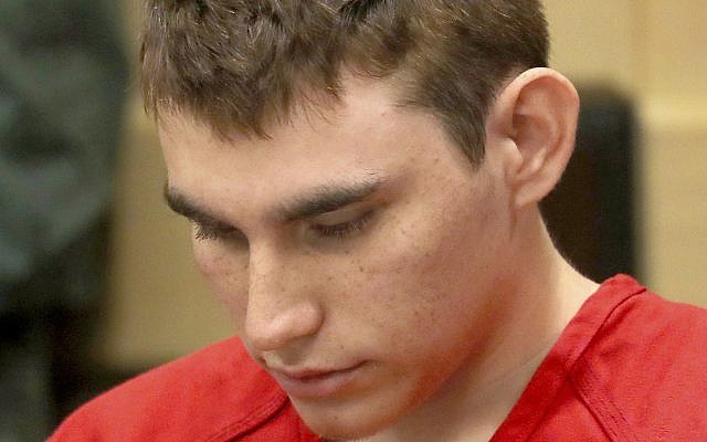 Nikolas Cruz appears in court for a status hearing before Broward Circuit Judge Elizabeth Scherer in Fort Lauderdale, Florida, February 19, 2018. (Mike Stocker/South Florida Sun-Sentinel via AP, Pool) Nikolas Cruz appears in court for a status hearing before Broward Circuit Judge Elizabeth Scherer in Fort Lauderdale, Florida, February 19, 2018. (Mike Stocker/South Florida Sun-Sentinel via AP, Pool)