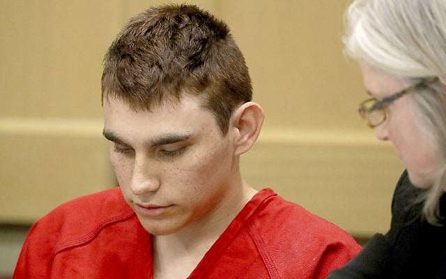 Nikolas Cruz appears in court for a status hearing before Broward Circuit Judge Elizabeth Scherer in Fort Lauderdale, Florida, on February 19, 2018. (Mike Stocker/South Florida Sun-Sentinel via AP, Pool) Nikolas Cruz appears in court for a status hearing before Broward Circuit Judge Elizabeth Scherer in Fort Lauderdale, Florida, on February 19, 2018. (Mike Stocker/South Florida Sun-Sentinel via AP, Pool)