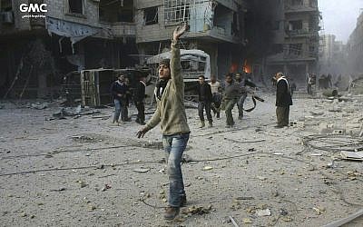 Syrians respond following airstrikes and shelling by Syrian government forces in Ghouta, a suburb of Damascus, Syria, in this photo, released February 21, 2018, by the Syrian anti-government activist group Ghouta Media Center. (Ghouta Media Center via AP) Syrians respond following airstrikes and shelling by Syrian government forces in Ghouta, a suburb of Damascus, Syria, in this photo, released February 21, 2018, by the Syrian anti-government activist group Ghouta Media Center. (Ghouta Media Center via AP)