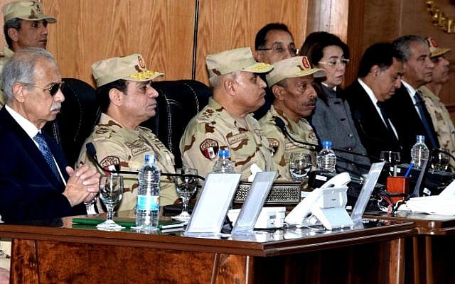 In this February 25, 2018 photo, provided by Egypt's state news agency MENA, Egyptian President Abdel-Fattah el-Sissi, third left, attends the inauguration of the East Suez Canal Counter-Terrorism command, in Sinai, Egypt. (MENA via AP) In this February 25, 2018 photo, provided by Egypt's state news agency MENA, Egyptian President Abdel-Fattah el-Sissi, third left, attends the inauguration of the East Suez Canal Counter-Terrorism command, in Sinai, Egypt. (MENA via AP)