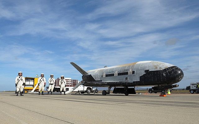 This undated photo provided by the US Air Force shows an X-37B Orbital Test Vehicle at NASA's Kennedy Space Center in Florida. (US Air Force via AP) This undated photo provided by the US Air Force shows an X-37B Orbital Test Vehicle at NASA's Kennedy Space Center in Florida. (US Air Force via AP)