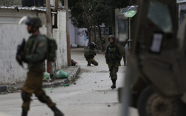 Israeli troops patrol the streets of the West Bank city of Jenin, Thursday, Jan. 18, 2018 (AP Photo/Majdi Mohammed) Israeli troops patrol the streets of the West Bank city of Jenin, Thursday, Jan. 18, 2018 (AP Photo/Majdi Mohammed)