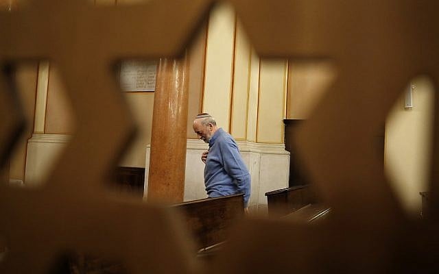 In this photo taken on Friday, Feb. 2, 2018, President of the Jewish Community Bruno Carmi stands inside a synagogue in Verona, Italy, February 2, 2018. (AP Photo/Antonio Calanni) In this photo taken on Friday, Feb. 2, 2018, President of the Jewish Community Bruno Carmi stands inside a synagogue in Verona, Italy, February 2, 2018. (AP Photo/Antonio Calanni)