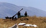 Illustrative photo of Syrian soldiers preparing an anti-aircraft gun. (AP/File)