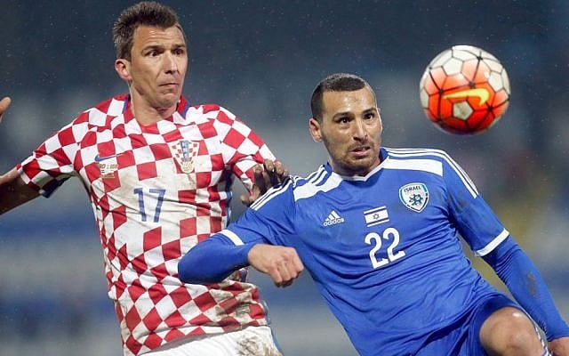 Israel's Shir Meir Tzedek, right, is challenged by Croatia's Mario Mandzukic during the international friendly soccer match between Croatia and Israel in Osijek, Croatia, Wednesday, March 23, 2016. (Darko Bandic/AP) Israel's Shir Meir Tzedek, right, is challenged by Croatia's Mario Mandzukic during the international friendly soccer match between Croatia and Israel in Osijek, Croatia, Wednesday, March 23, 2016. (Darko Bandic/AP)