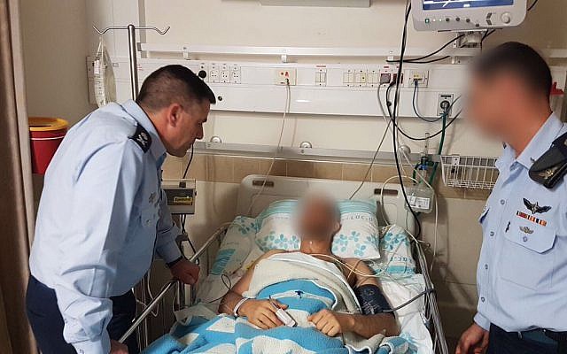 Air Force head Amiram Norkin, left, and an unidentified officer, right, visiting an injured pilot in Rambam Hospital in Haifa on February 11, 2018, in a picture released by the IDF on February 12, 2018. (IDF Spokesperson's Unit) Air Force head Amiram Norkin, left, and an unidentified officer, right, visiting an injured pilot in Rambam Hospital in Haifa on February 11, 2018, in a picture released by the IDF on February 12, 2018. (IDF Spokesperson's Unit)