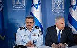 Israel Police Commissioner Roni Alsheich, seen with Prime Minister Benjamin Netanyahu, at a welcoming ceremony for his appointment, held at the Prime Minister's Office in Jerusalem, on December 3, 2015. (Miriam Alster/Flash90)