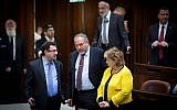 Yisrael Beytenu party leader Avigdor Liberman (C) seen during a plenum session in the Israeli parliament on December 30, 2015. On the left is Yisrael Beytenu MK Robert Ilatov; to his right is Immigration Absorption Minister Sofa Landver. (Miriam Alster/FLASH90)