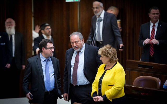 Yisrael Beytenu party leader Avigdor Liberman (C) seen during a plenum session in the Israeli parliament on December 30, 2015. On the left is Yisrael Beytenu MK Robert Ilatov; to his right is Immigration Absorption Minister Sofa Landver. (Miriam Alster/FLASH90) Yisrael Beytenu party leader Avigdor Liberman (C) seen during a plenum session in the Israeli parliament on December 30, 2015. On the left is Yisrael Beytenu MK Robert Ilatov; to his right is Immigration Absorption Minister Sofa Landver. (Miriam Alster/FLASH90)