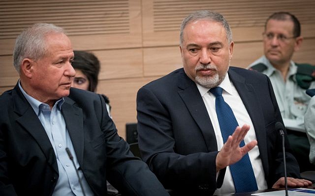 Defense Minister Avigdor Liberman (R) and head of the Knesset's Foreign Affairs and Defense Committee Avi Dichter in the Knesset on June 26, 2017. (Yonatan Sindel/Flash90) Defense Minister Avigdor Liberman (R) and head of the Knesset's Foreign Affairs and Defense Committee Avi Dichter in the Knesset on June 26, 2017. (Yonatan Sindel/Flash90)