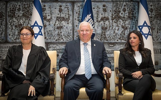 President Reuven Rivlin, center, Justice Minister Ayelet Shaked right, and Supreme Court President Esther Hayut attend a swearing in ceremony for newly appointed judges at the President's Residence in Jerusalem, on October 30, 2017. (Yonatan Sindel/Flash90) President Reuven Rivlin, center, Justice Minister Ayelet Shaked right, and Supreme Court President Esther Hayut attend a swearing in ceremony for newly appointed judges at the President's Residence in Jerusalem, on October 30, 2017. (Yonatan Sindel/Flash90)