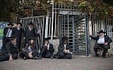 Ultra-Orthodox men holding a sit-in in front of an army recruitment center in Jerusalem, on November 28, 2017. (Flash90)