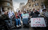 Disabled activists protesting in central Jerusalem on January 3, 2018.  (Yonatan Sindel/Flash90)