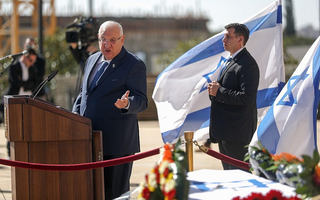 President Reuven Rivlin speaks in front of Haim Gouri's coffin outside the Jerusalem Theatre on February 1, 2018. (Yonatan Sindel/Flash90) President Reuven Rivlin speaks in front of Haim Gouri's coffin outside the Jerusalem Theatre on February 1, 2018. (Yonatan Sindel/Flash90)