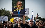 Israelis attend a weekly protest against public corruption in Tel Aviv on February 16, 2018 (Miriam Alster/Flash90)
