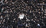 Ultra-Orthodox followers of Rabbi Shmuel Auerbach mourn during his funeral in Jerusalem, on February 25, 2018. Yonatan Sindel/Flash90)