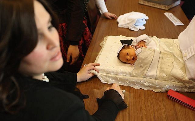 Illustrative: A brit, or Jewish circumcision ceremony, in Berlin, Germany. (Sean Gallup/Getty Images via JTA) Illustrative: A brit, or Jewish circumcision ceremony, in Berlin, Germany. (Sean Gallup/Getty Images via JTA)