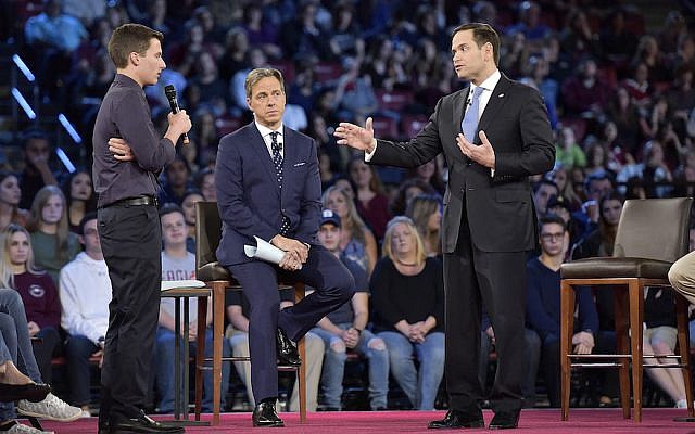 Illustrative: Marjory Stoneman Douglas student Cameron Kasky asks Sen. Marco Rubio (R-Fla.), right, if he will continue to accept money from the NRA during a CNN town hall meeting on February 21, 2018, at the BB&T Center, in Sunrise, Florida. (Michael Laughlin/Sun Sentinel/TNS via Getty Images via JTA) Illustrative: Marjory Stoneman Douglas student Cameron Kasky asks Sen. Marco Rubio (R-Fla.), right, if he will continue to accept money from the NRA during a CNN town hall meeting on February 21, 2018, at the BB&T Center, in Sunrise, Florida. (Michael Laughlin/Sun Sentinel/TNS via Getty Images via JTA)
