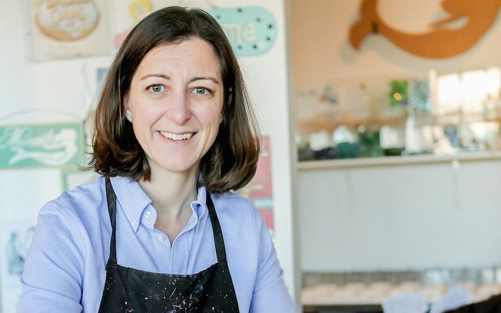 Elaine Luria at the Norfolk, Virginia shop she owns called the Mermaid Factory. (Courtesy of the Luria campaign/via JTA) Elaine Luria at the Norfolk, Virginia shop she owns called the Mermaid Factory. (Courtesy of the Luria campaign/via JTA)
