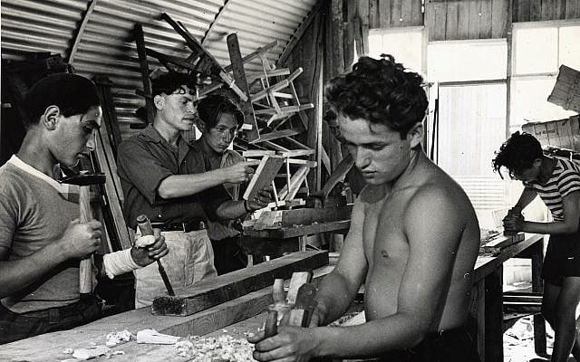 A woodworking class in the trade school established and funded by the American Jewish Joint Distribution Committee at a Cyprus detention camp in 1947. (Courtesy JDC Archives via JTA) A woodworking class in the trade school established and funded by the American Jewish Joint Distribution Committee at a Cyprus detention camp in 1947. (Courtesy JDC Archives via JTA)